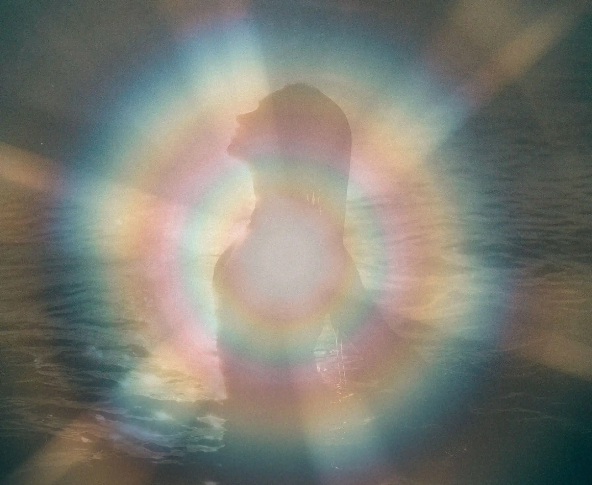 Silhouette within a soft aura gradient, The Aura Code™ mentorship by Ari Saso