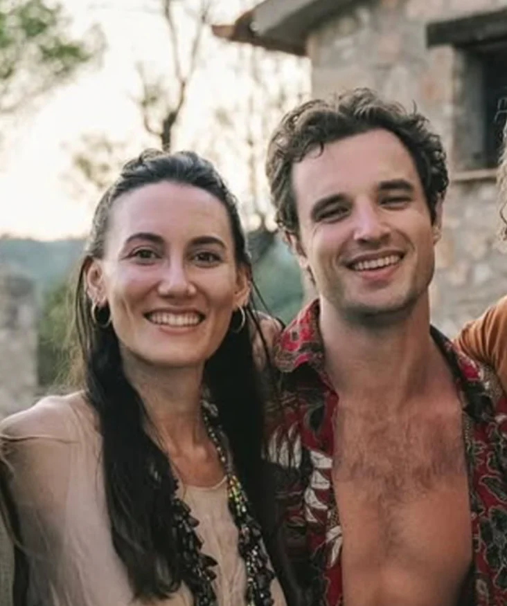 The founders of Taozen, smiling together outside a stone house